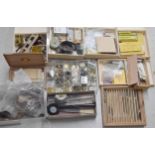 Large quantity of various Bergeon and other clock fittings, including bushings, cutting-broaches,