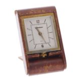 Jaeger-LeCoultre travel clock, the gilt metal case hinged within a tan leather travel case, case no.