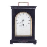 Good small English ebonised single fusee campaign table clock, the 3" silvered arched dial signed