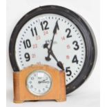 Leningrad Electric Clock Works 16" dial slave clock within a blackened metal case; also a
