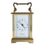 Contemporary Woodford carriage clock timepiece, within a corniche style brass case, 6.25" high (key)