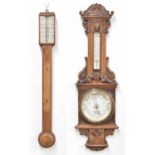 Oak stick barometer/thermometer, the silvered angled scale signed Davis, Leeds, over a flat trunk