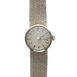 Omega 9ct lady's wristwatch, Birmingham 1973, champagne dial with applied baton markers, integral