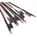 Seven nickel mounted violin bows (7)