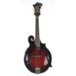 Michael Kelly electric mandolin, Model L-DLY-E, with dark sunburst finish and inlaid mother of pearl