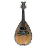 Neapolitan mandolin labelled Adolfo Lauri, Strumenti Artistici, Napoli, profusely decorated and with