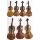 Seven old various three-quarter size violins mostly in need of some attention (7)