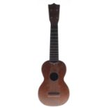 Martin & Co ukulele, bearing the maker's stamp to the inside back, also bearing the maker's name