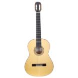 David Oddy classical guitar, made in England; Back and sides: cypress; Top: natural spruce; Neck: