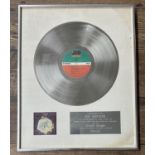 Jon Anderson (Yes) - presentation award disc presented to Jon Anderson to commemorate the sale of