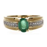 18ct yellow gold emerald and diamond dress ring with set shoulders, the emerald 0.80ct approx, width