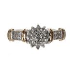 9ct diamond cluster ring with set shoulders, 9mm, 2.7gm, ring size M