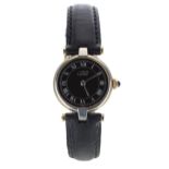 Must de Cartier silver-gilt lady's wristwatch, serial no. 18008xxx, black dial, cabouchon crown,