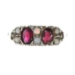 9ct scroll set garnet and opal ring, width 7mm, 3.8gm, ring size P