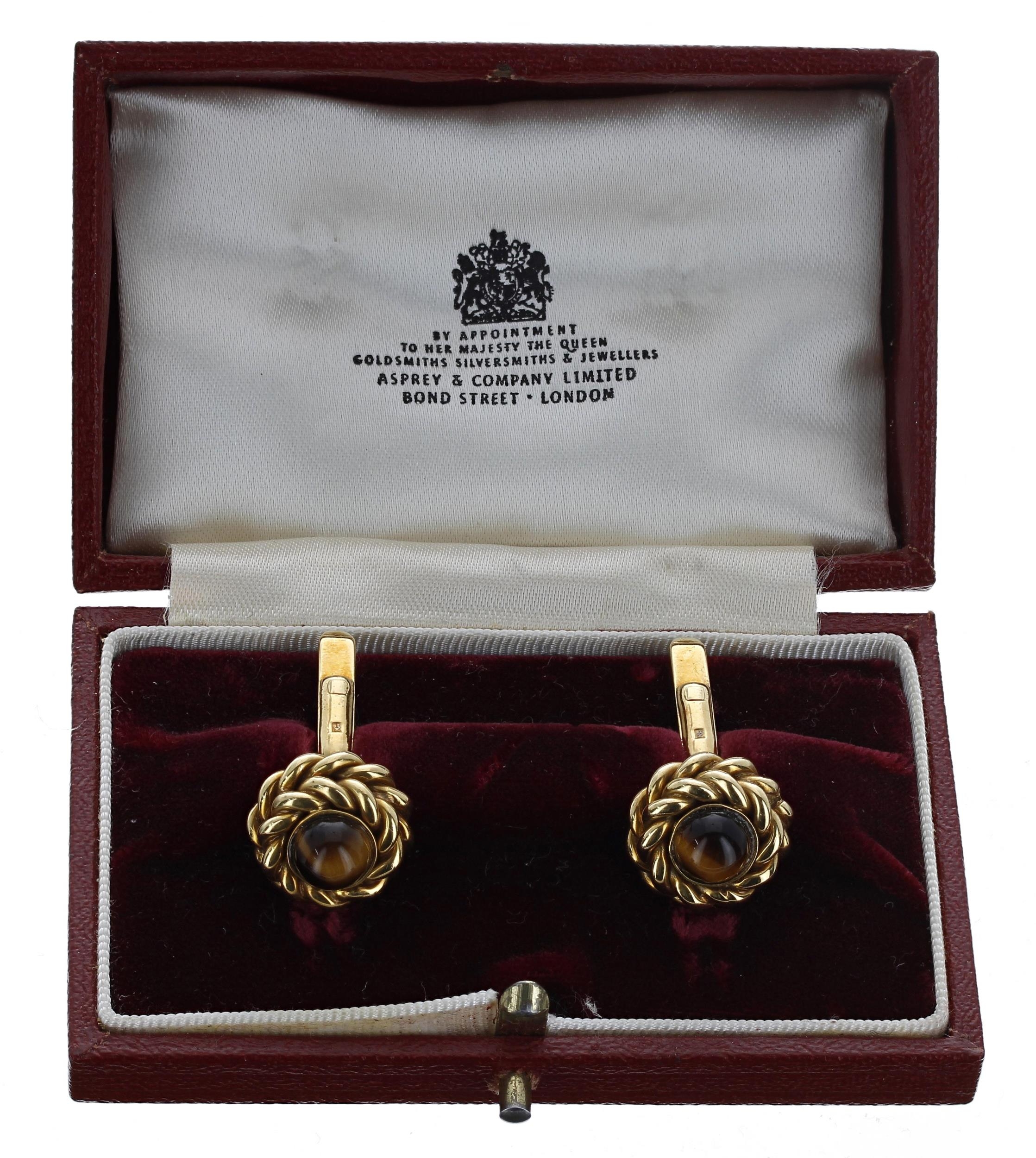 Pair of 18ct 'tiger's eye' cufflinks, London 1977, 20gm, 15.5mm ...