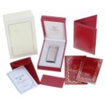 Must de Cartier Briquet lighter, signed no. E01965, 59mm ** with the original box and related