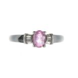 Attractive modern 18ct white gold pink sapphire and tapered baguette diamond ring, the sapphire 0.