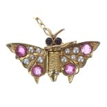 Attractive miniature gold novelty fly brooch, with sprung wings set with four small round rubies,
