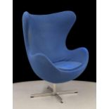 After Arne Jacobson - upholstered egg chair, pale blue, on a chrome support, 34" wide, 45" high