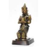 Large Thai porcelain figure of a 'Tepanom' guardian angel figure in prayer, with mottled green