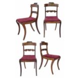 Set of four Regency rosewood dining chairs, the shaped carved bar backs with brass inlay scroll