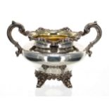 Victorian silver twin-handled sucrier, with C scroll handles and a cast foliate rim, the interior