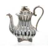 George IV silver coffee pot, the hinged cover with cast foliate finial, a leaf capped handle and a