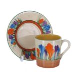 Clarice Cliff Bizarre 'Crocus' coffee can and saucer, the can 2.25" high, the saucer 4.25" diameter