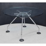 Sir Norman Foster for Tecno, 'Nomos' circular table, the glass top on a chrome plated steel