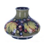 Moorcroft Pottery 'Leaf and Berry' squat vase, with factory stamps to the underside, 5" high
