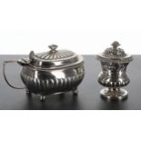 George III silver mustard pot, the reeded hnged cover enclosing a blue glass liner, over a half