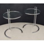 After Eileen Gray (Irish 1878-1976) - pair of model E1027 bedside tables, the circular glass top