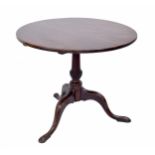 Georgian mahogany circular occasional table, the plain tilt top raised on a central carved pillar