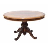 Victorian walnut and marquetry inlaid circular breakfast table, the butterfly veneered foliate