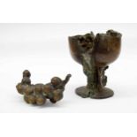 Interesting decorative bronze goblet sculpture, modelled distressed and split at the seam, enclosing