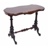 Victorian rosewood serpentine stretcher side table, the moulded top over a shaped apron, raised on