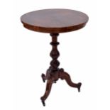 Victorian rosewood circular side table, raised on a carved central support over three carved