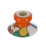 Clarice Cliff Fantasque Bizarre 'Autumn' squat candlestick, shape 331, 2" high, 3.5" diameter