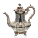 Victorian silver coffee pot, the hinged cover with a foliate and floral cast finial, with a leaf
