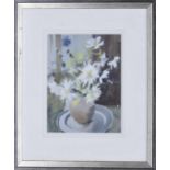 Kim Page (20th/21st century) - Still life of white lilies and other flowers in a glass vase beside a