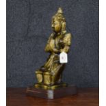 Large Thai porcelain figure of a 'Tepanom' guardian angel figure in prayer, with mottled green