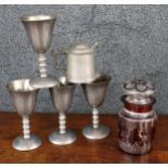 Four English pewter goblets, 5.5" high; together with a pewter mustard pot with hinged cover and