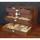 Small pine counter-top chest of five drawers containing an interesting collection of antique pottery