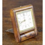 Jaeger 1930s tan leather bound folding travel clock with alarm, 3.75" x 2.5"