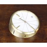 Jaeger LeCoultre brushed brass desk clock, the dial with baton markers and date aperture, 3.75"