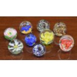 Nine assorted decorative glass paperweights (9)
