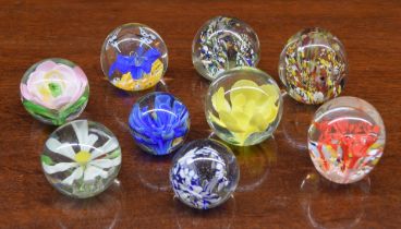 Nine assorted decorative glass paperweights (9)