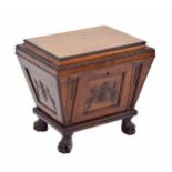 Fine Regency mahogany cellarette, of sarcophagus form with a hinged cover enclosing a metal lined