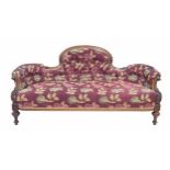 Victorian walnut salon settee, the shaped curved button upholstered back over a stuff-over