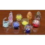 Nine assorted decorative glass paperweights; including a fish by Chris Dodds (9)
